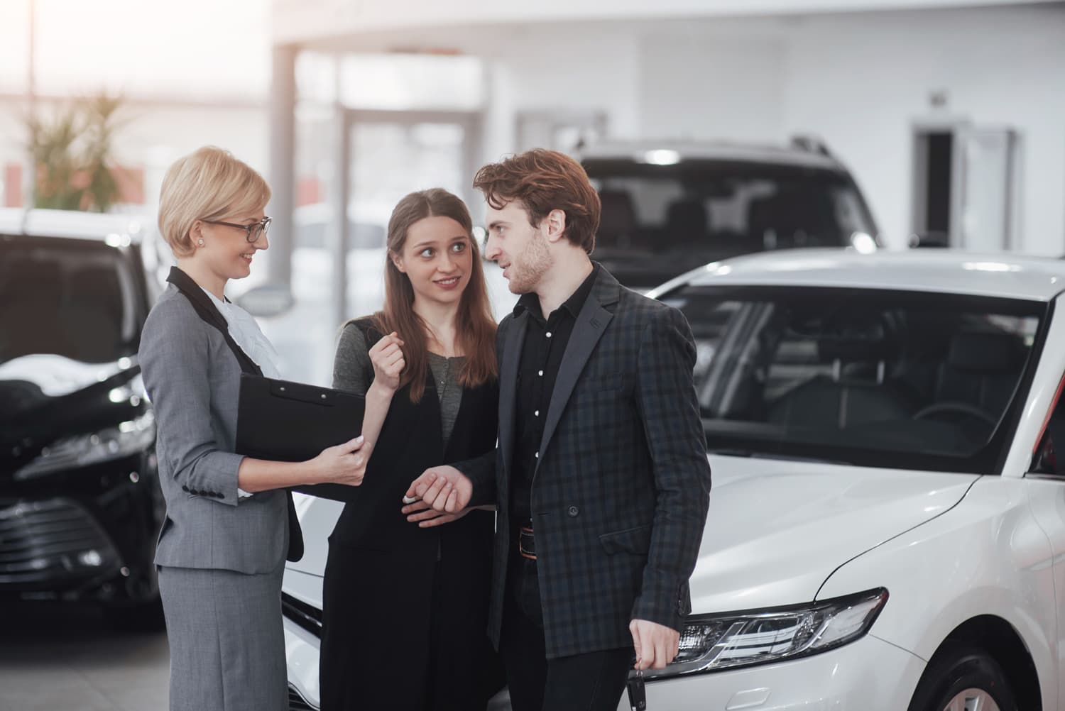 Happy customers at the dealership